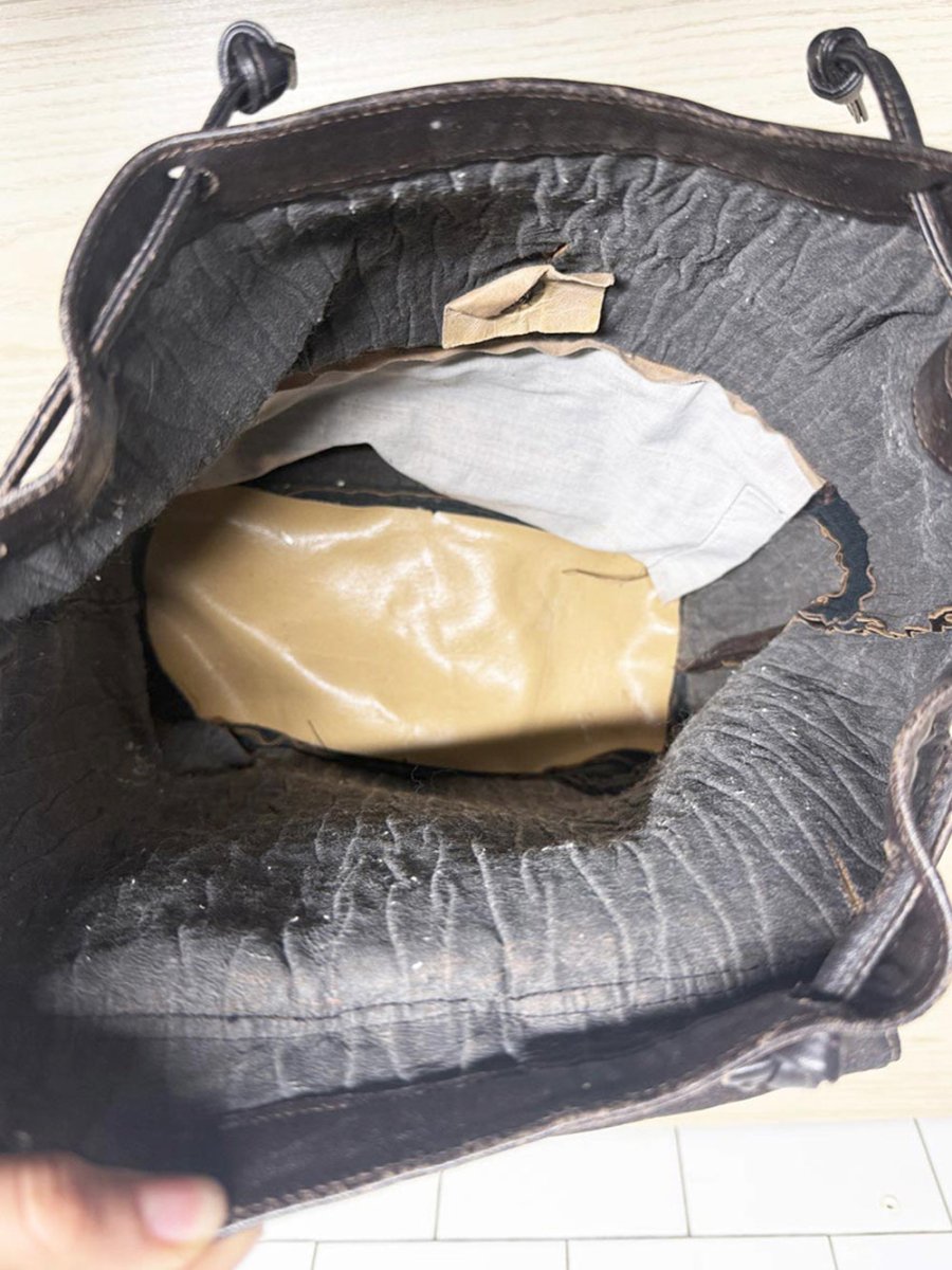 vintage textured drawstring leather backpack - good market thrift store