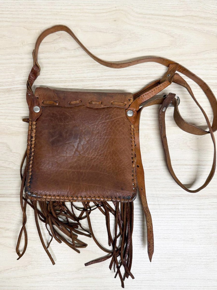 vintage woven tassel leather crossbody bag - good market thrift store
