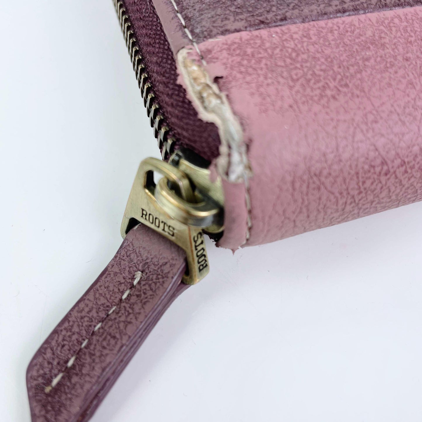 roots faux pebbled leather zip around wallet