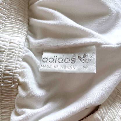 vintage 90's white adidas trefoil lined track pants - size medium