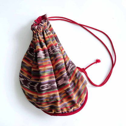 vintage boho hand loomed ikat woven sling backpack