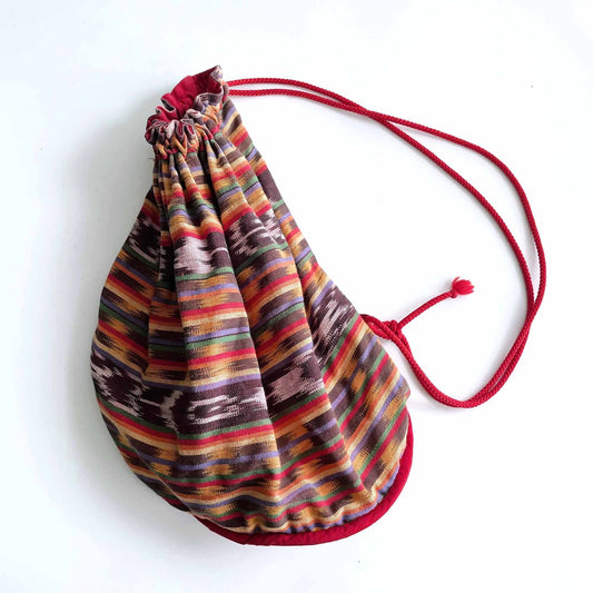vintage boho hand loomed ikat woven sling backpack