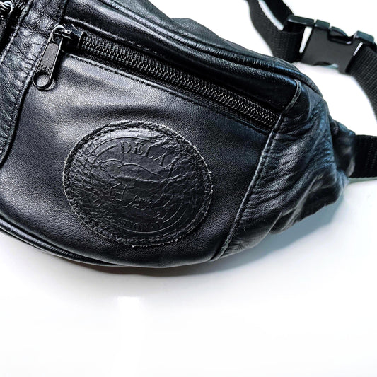 vintage black leather fanny pack with polar bear crest