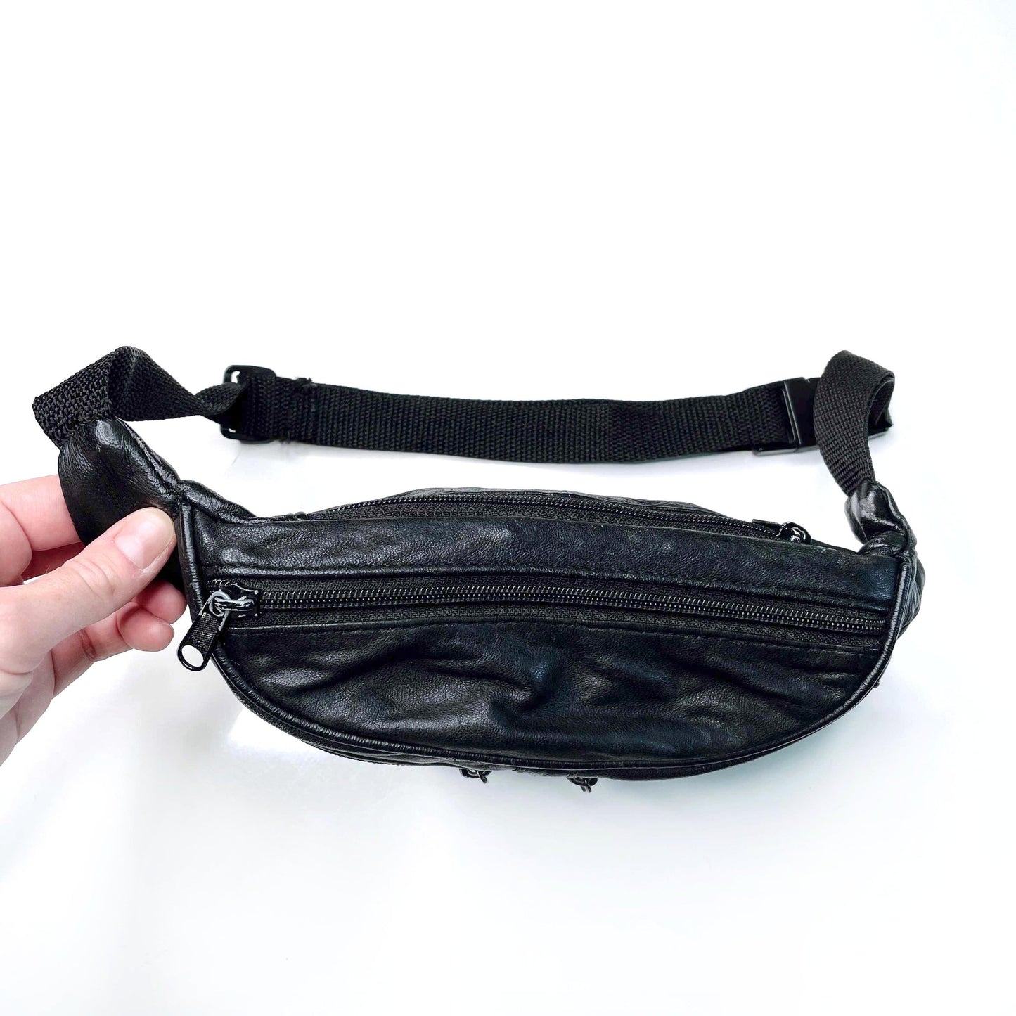 vintage black leather fanny pack with polar bear crest