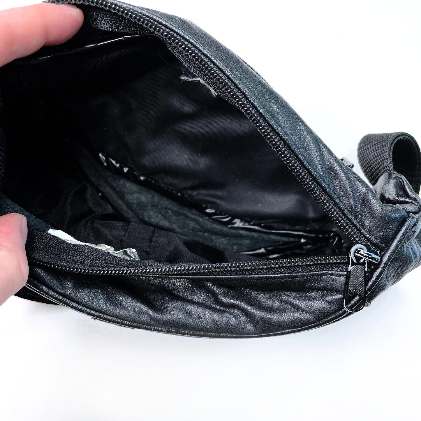 vintage black leather fanny pack with polar bear crest