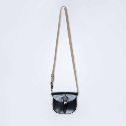 Mini leather saddle cross body bag with woven strap
