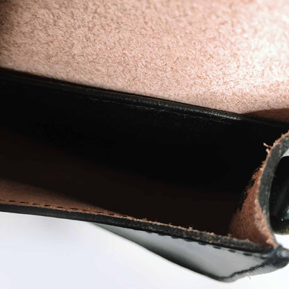 Mini leather saddle cross body bag with woven strap