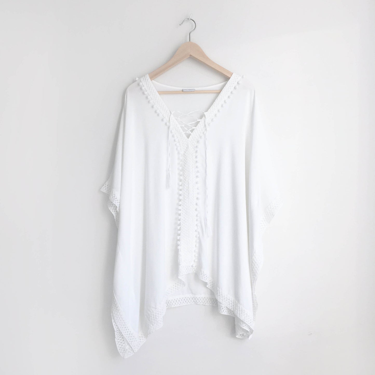 Bindya NY pom pom lace up tunic - size OS