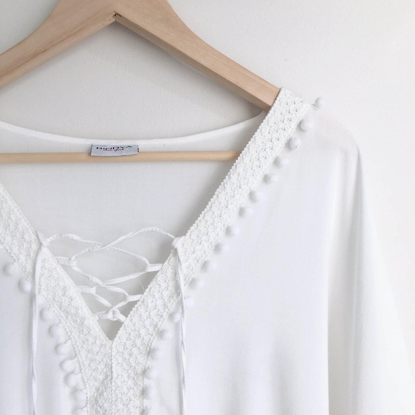 Bindya NY pom pom lace up tunic - size OS