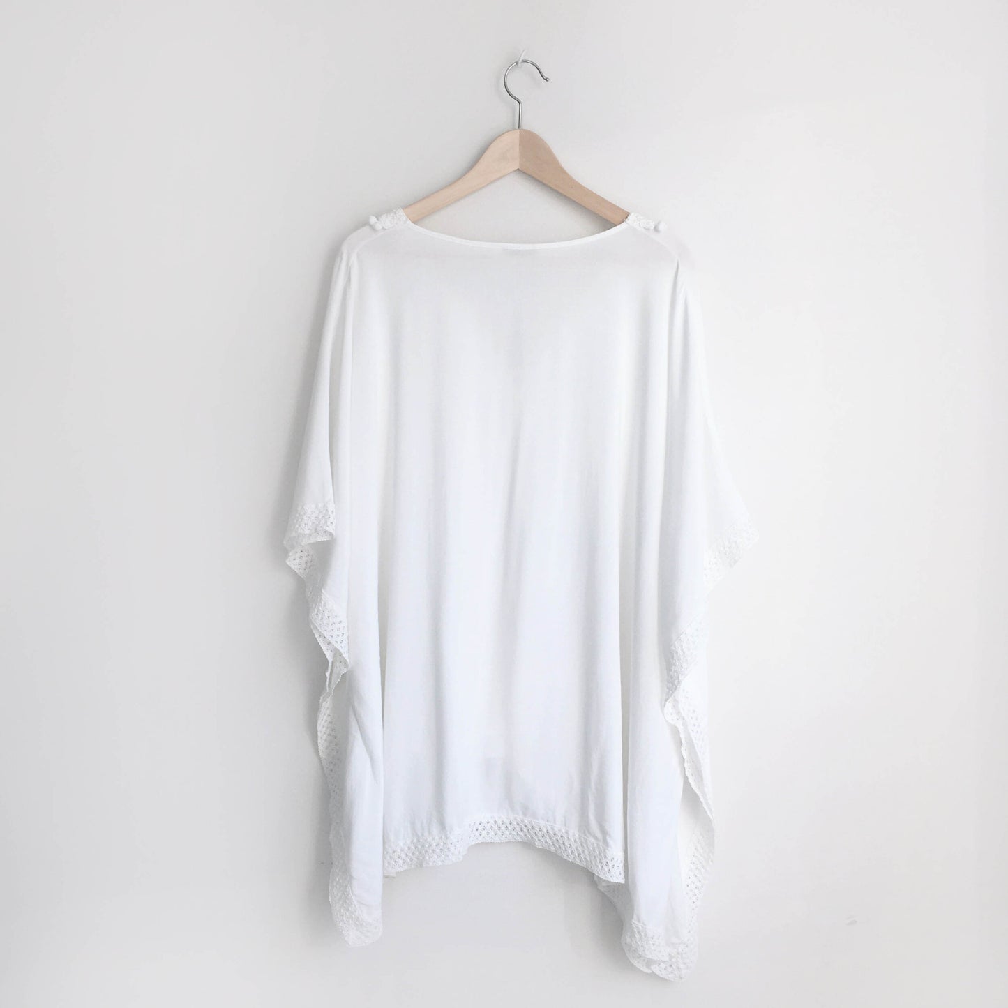 Bindya NY pom pom lace up tunic - size OS