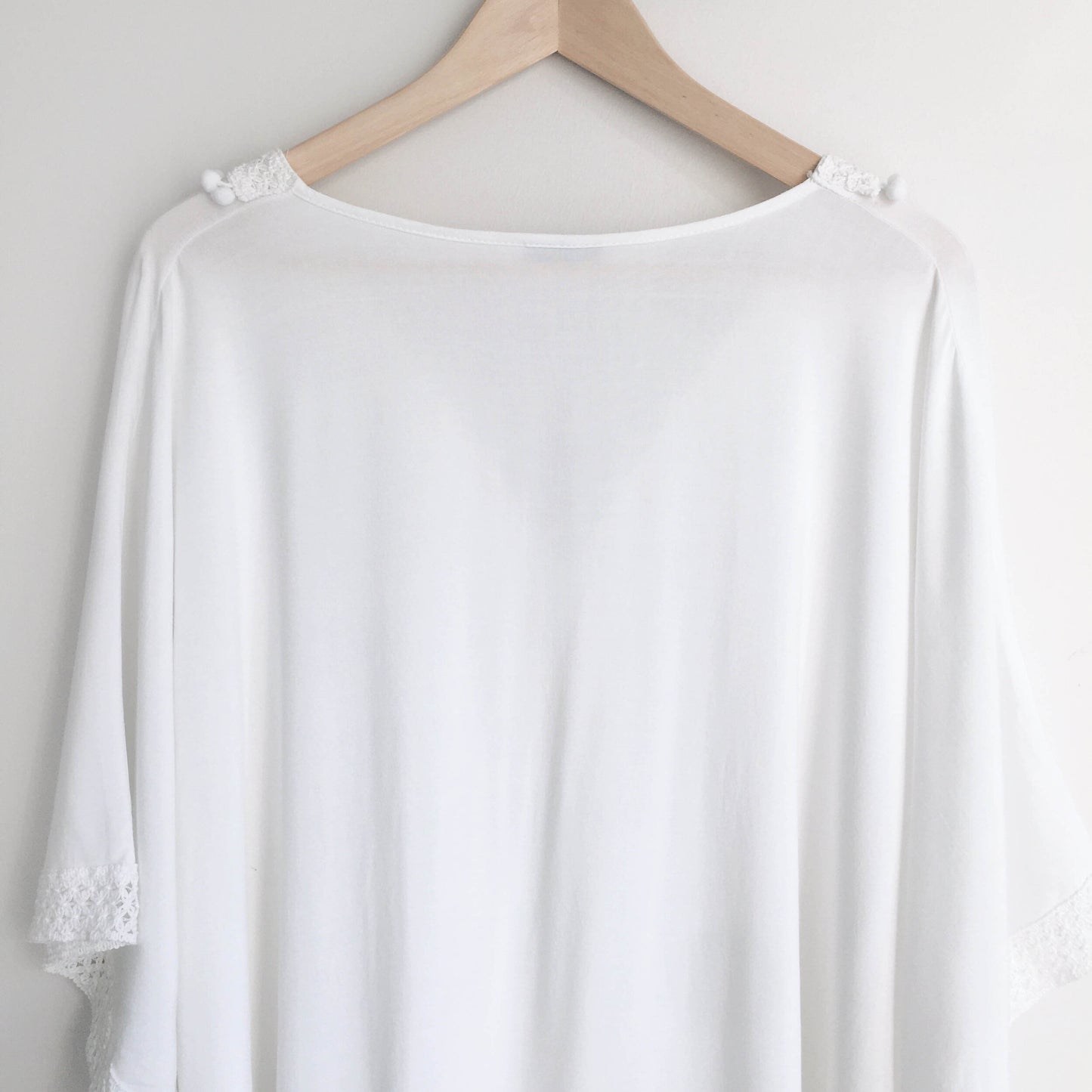 Bindya NY pom pom lace up tunic - size OS