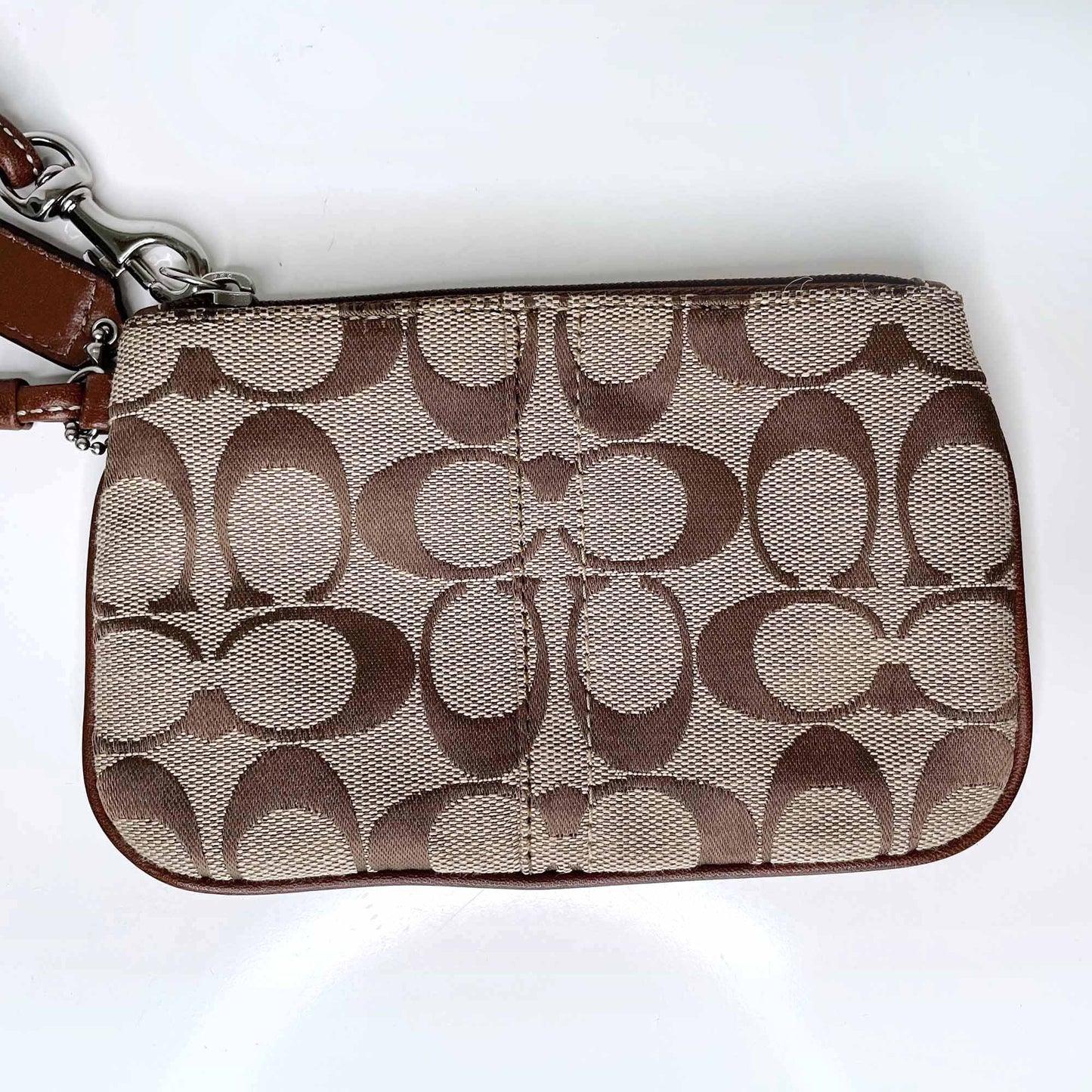 coach signature brown c logo wristlet