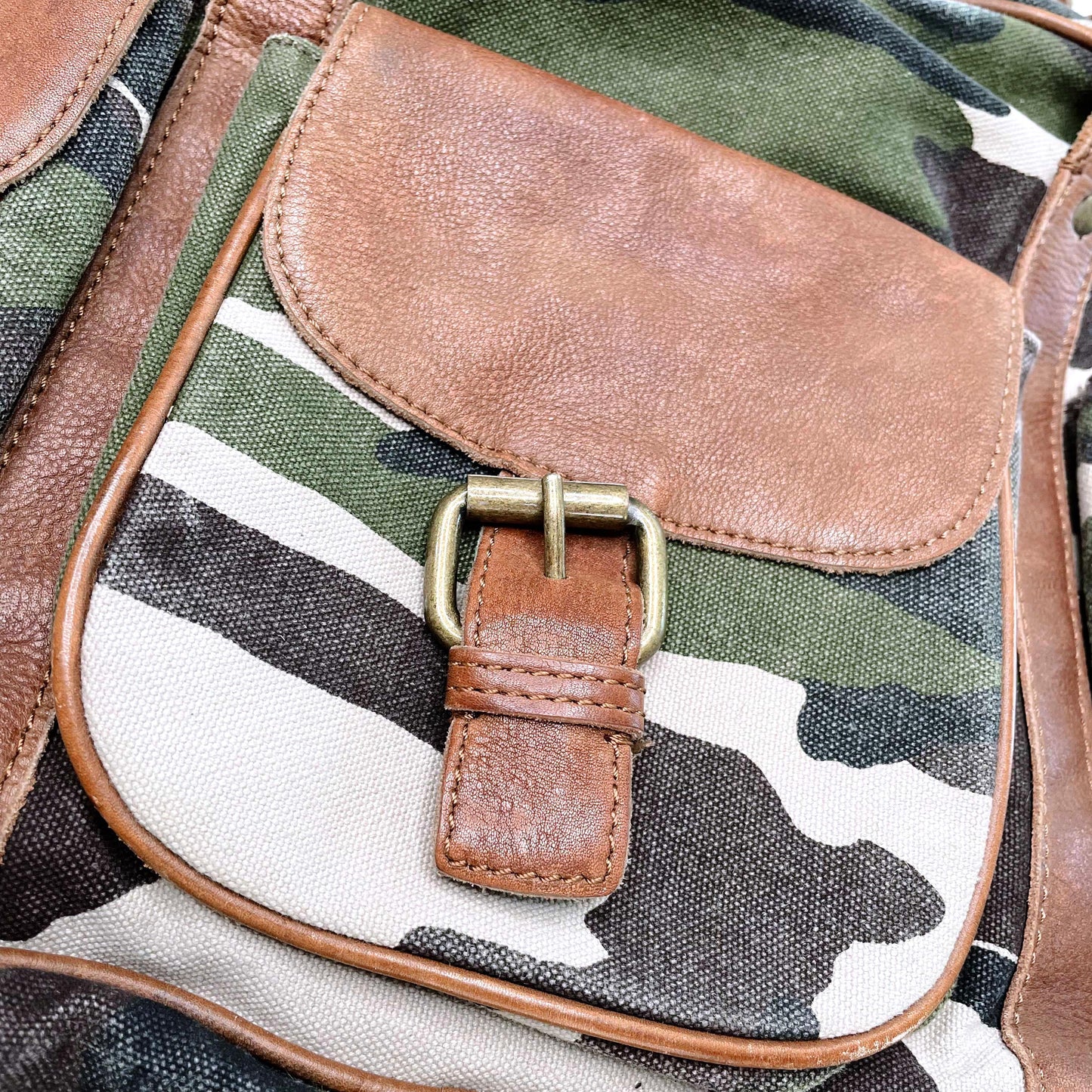 fossil camo duffle bag with brown leather trim