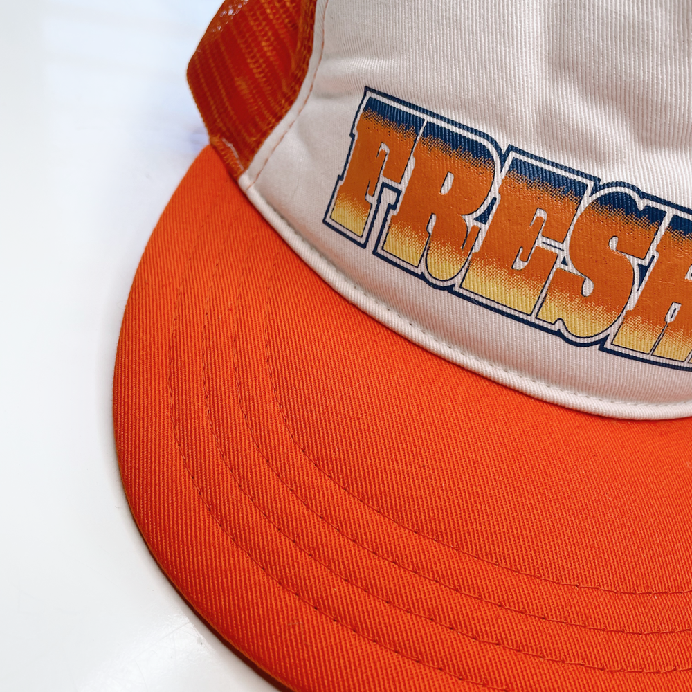 freshie orange trucker hat
