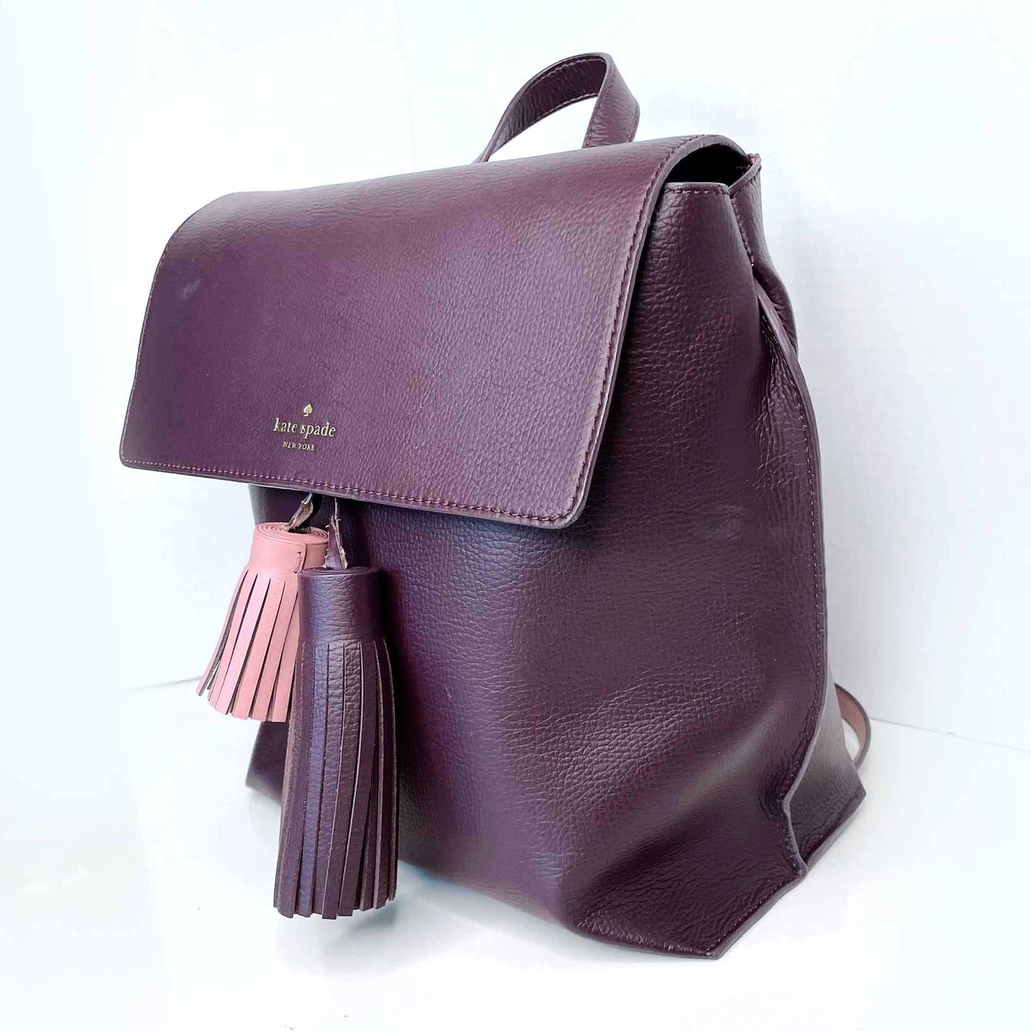 kate spade foster court kirk tassel leather backpack