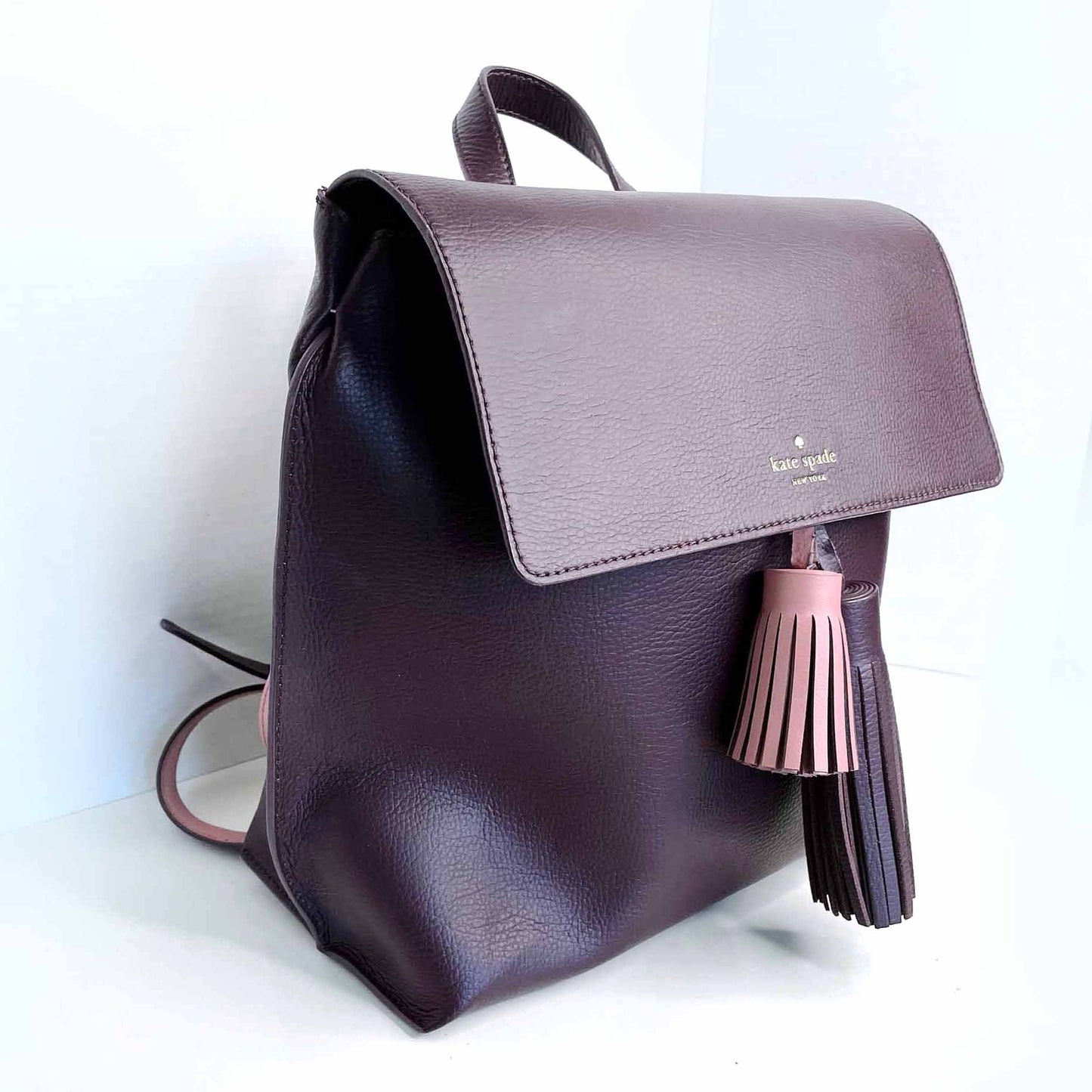 kate spade foster court kirk tassel leather backpack