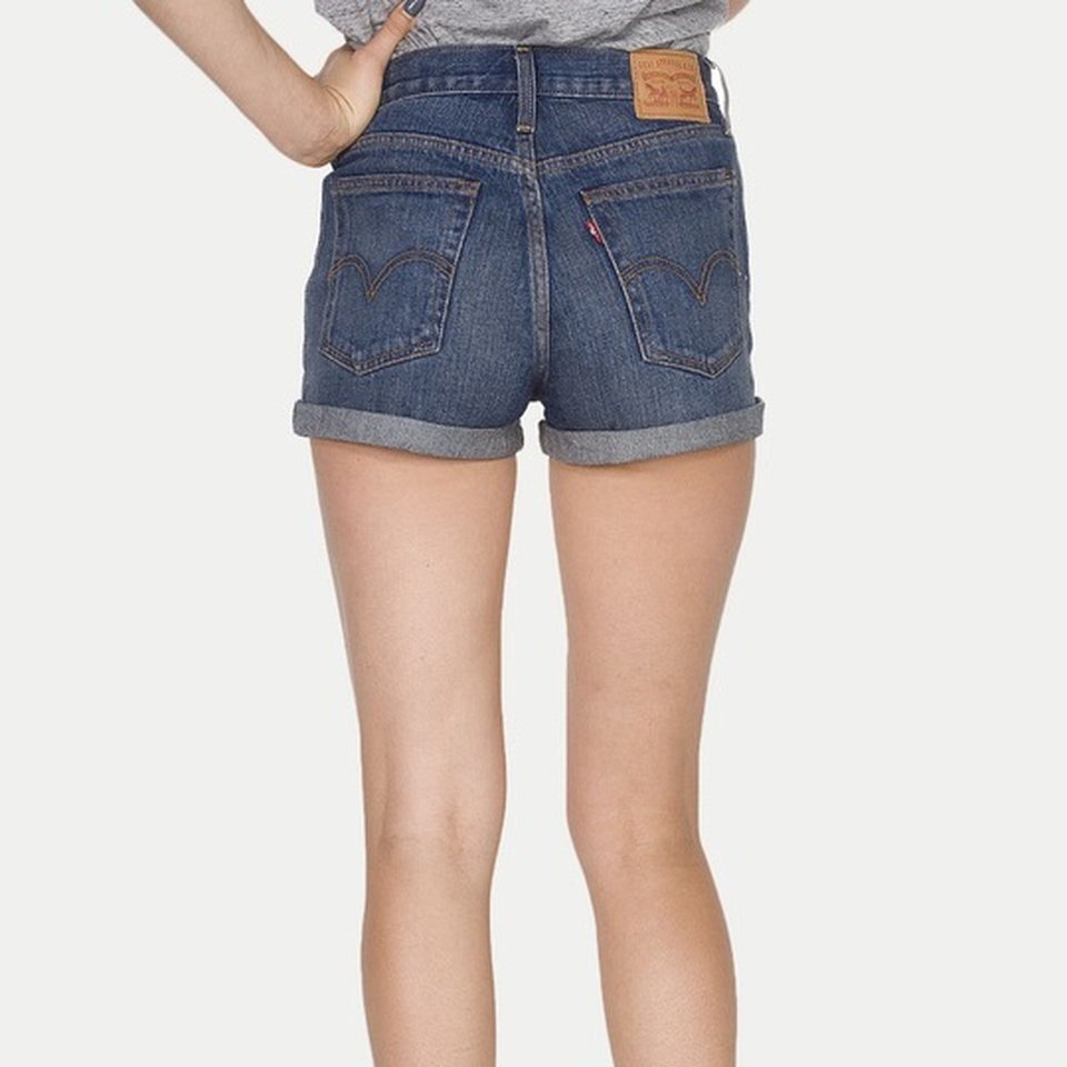 Levi's high rise rolled hem denim shorts - size 24