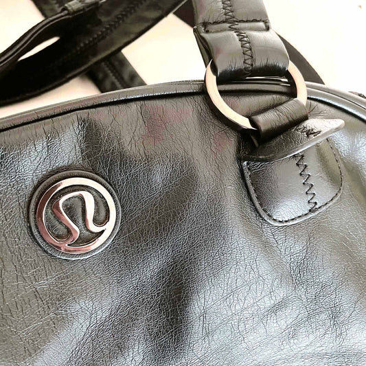 lululemon faux leather gym travel bag with ruffle trim