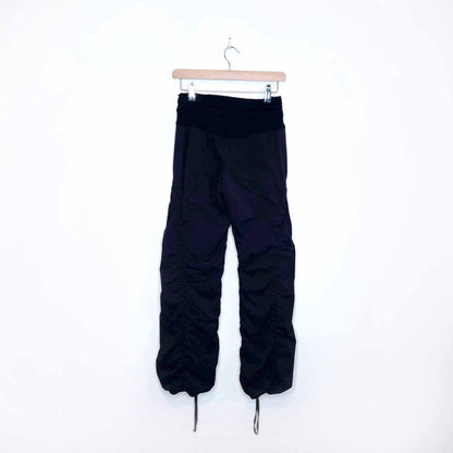 lululemon mid-rise lined dance studio on the move pants - size 4