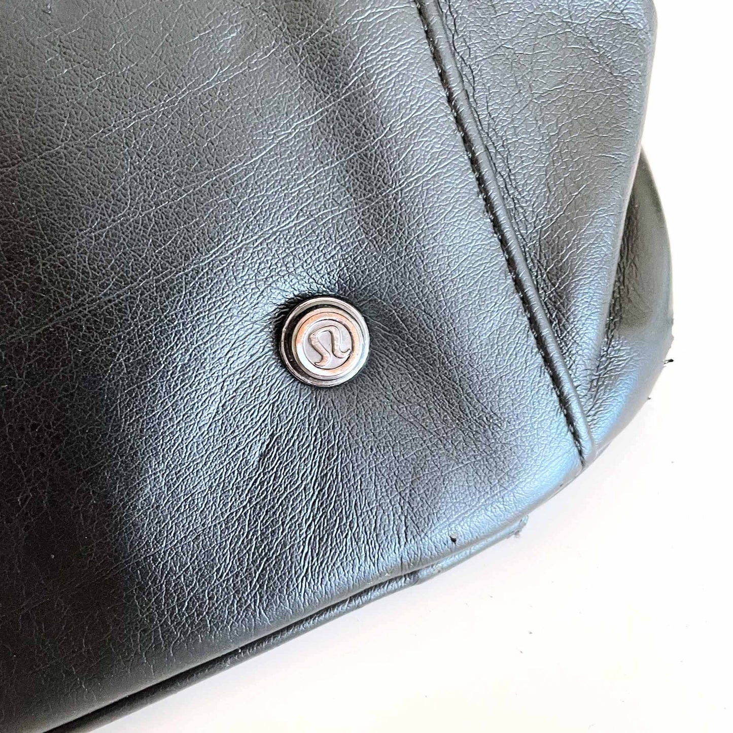 lululemon faux leather gym travel bag with ruffle trim