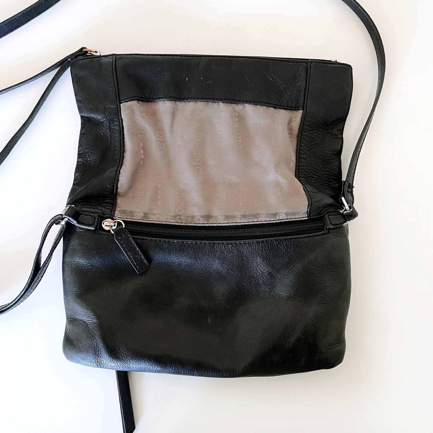 Margot Robbie fold-over versatile leather cross body