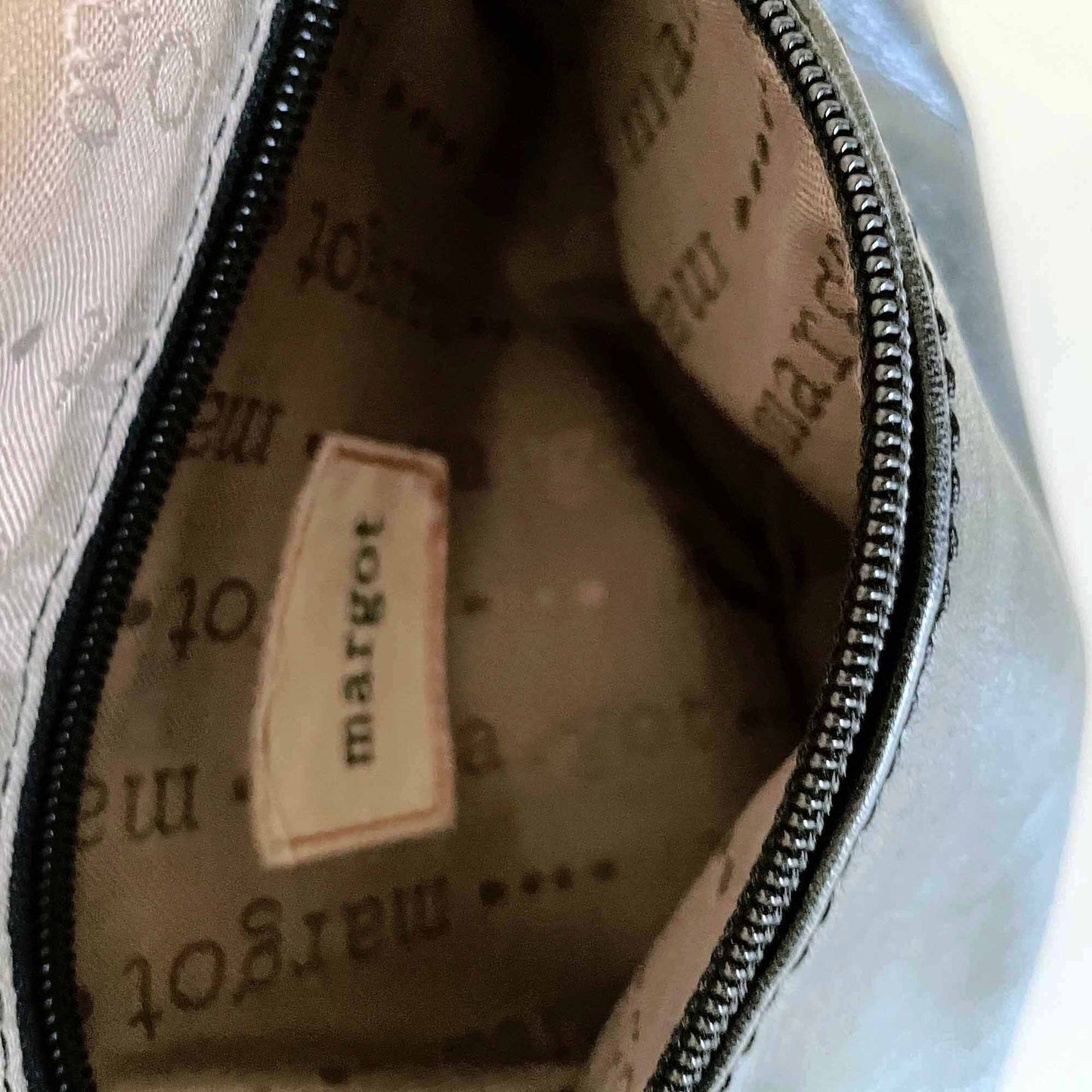 Margot Robbie fold-over versatile leather cross body