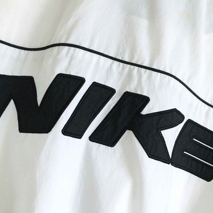 Vintage Nike Windbreaker with zip-off sleeves - size Medium