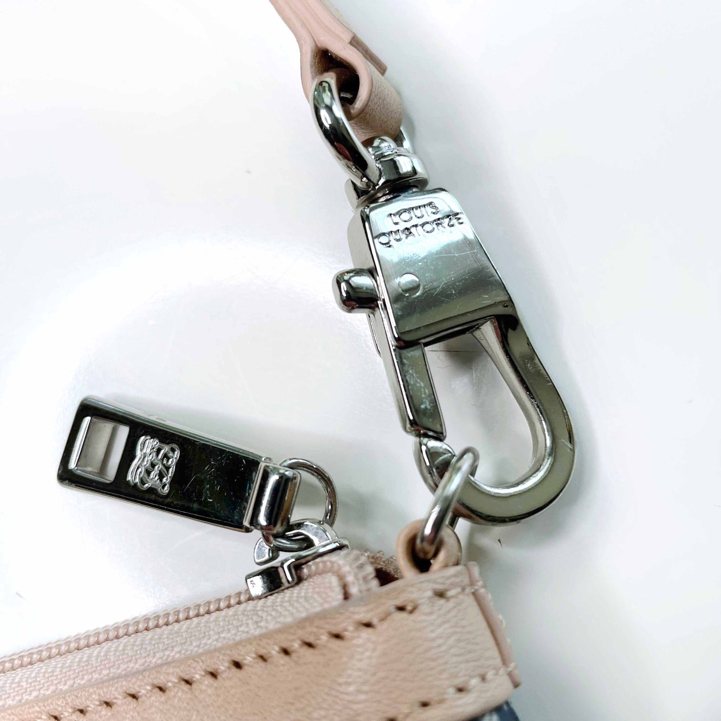 louis quatorze mini monogram pochette wristlet