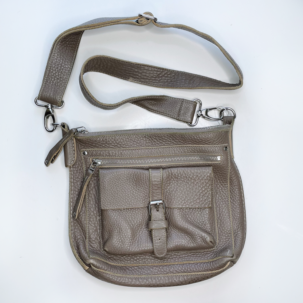 roots pebbled leather crossbody bag with front cargo pocket