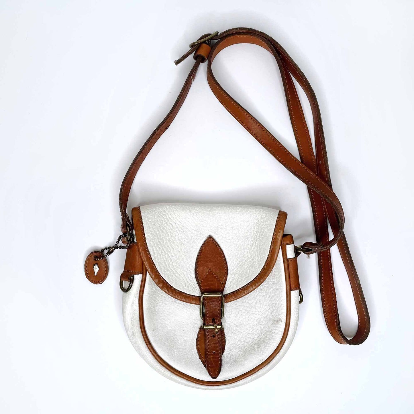vintage roots white leather saddle crossbody with brown trim