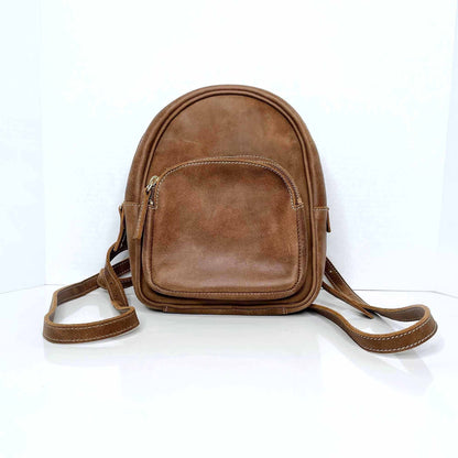 roots mini brown leather tribe backpack