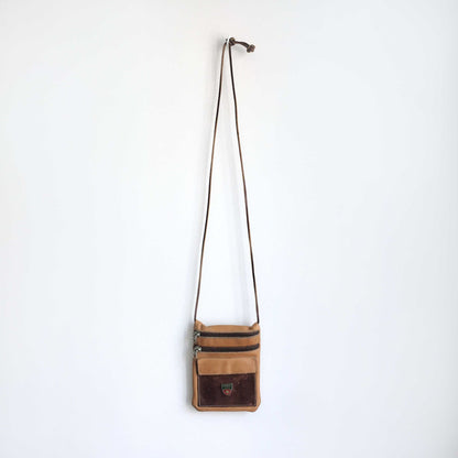 Roots vintage mini leather cross body
