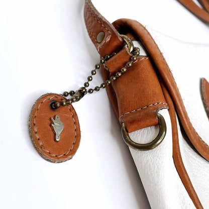 vintage roots white leather saddle crossbody with brown trim