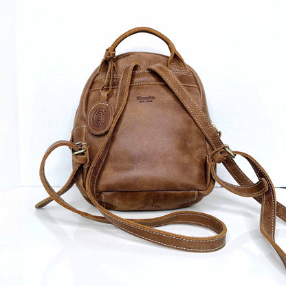 roots mini brown leather tribe backpack