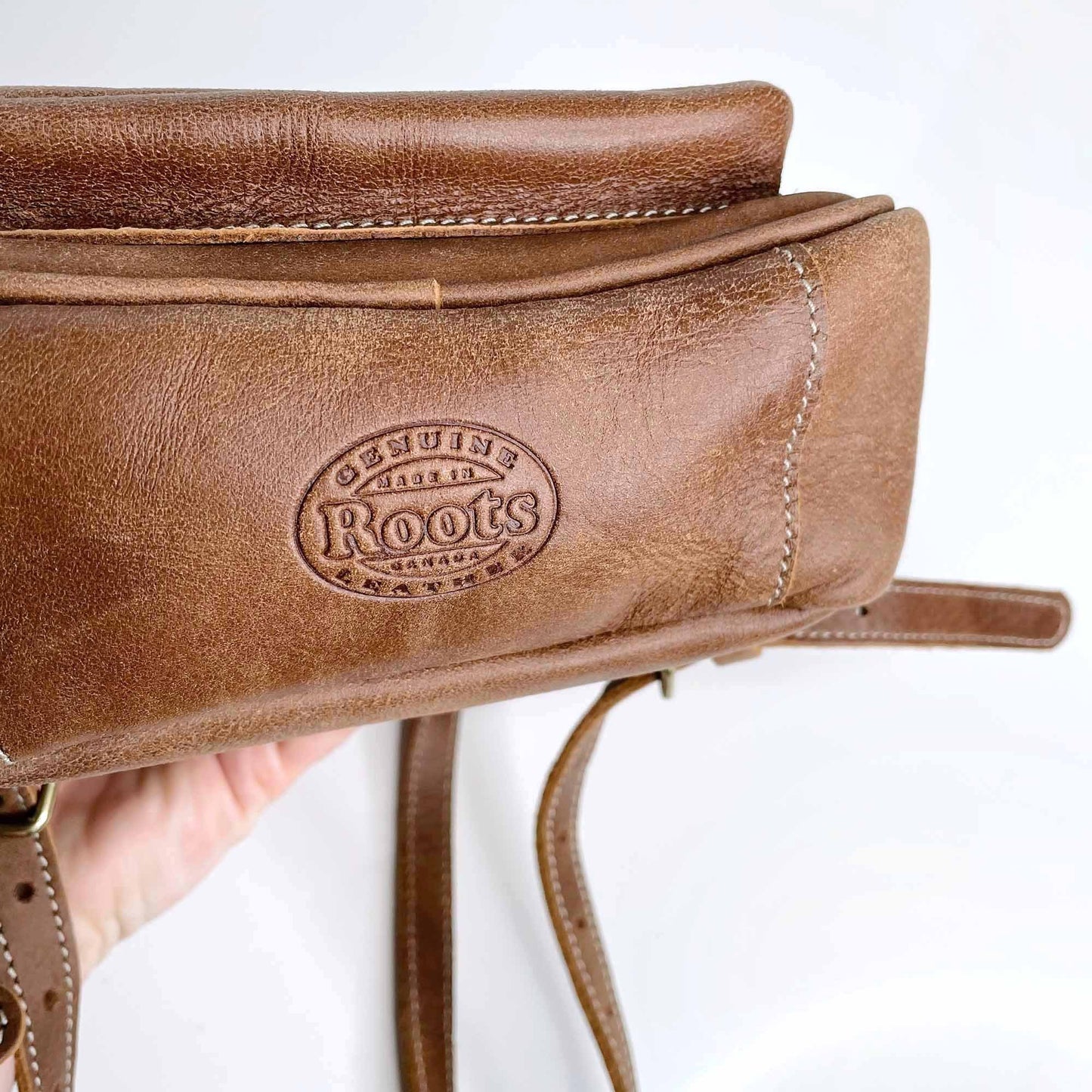 roots mini brown leather tribe backpack