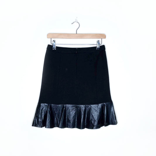 sandro black mini skirt with faux leather peplum hem - size 2
