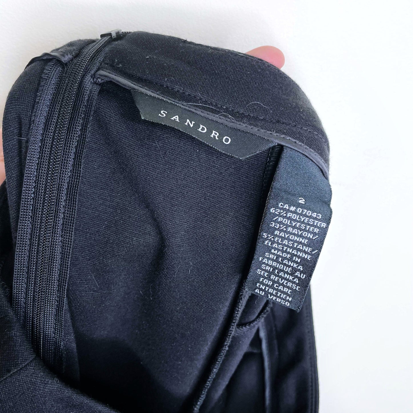 sandro black mini skirt with faux leather peplum hem - size 2