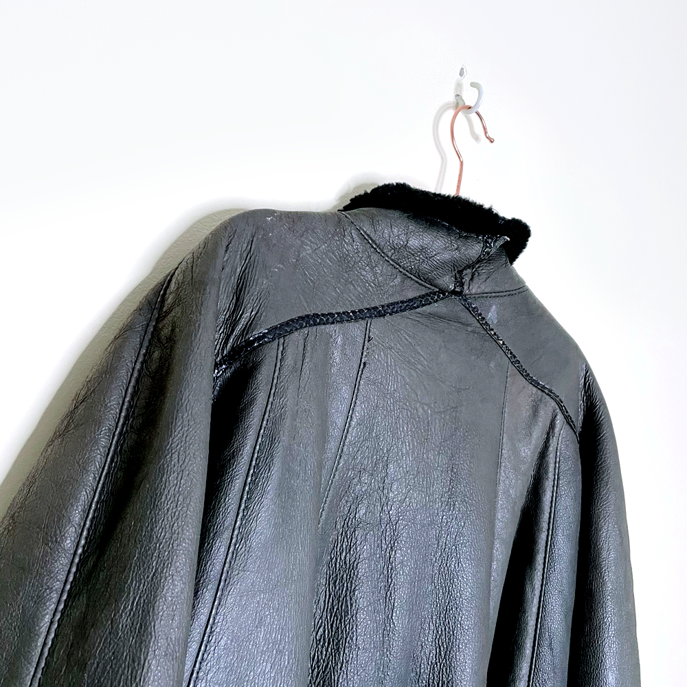 vintage 60s black a-line swing hem long sheepskin coat - size l/xl