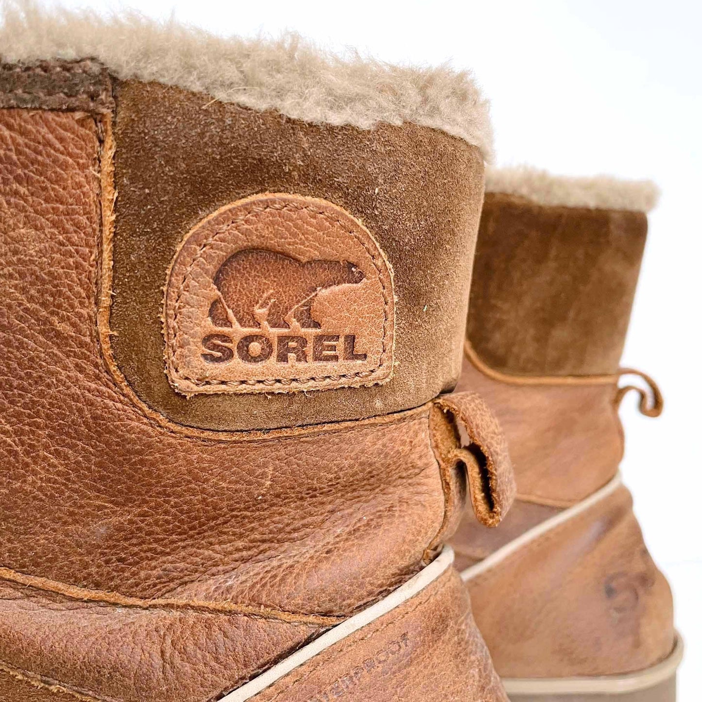 sorel brown leather winter boots with faux fur lining - size 8