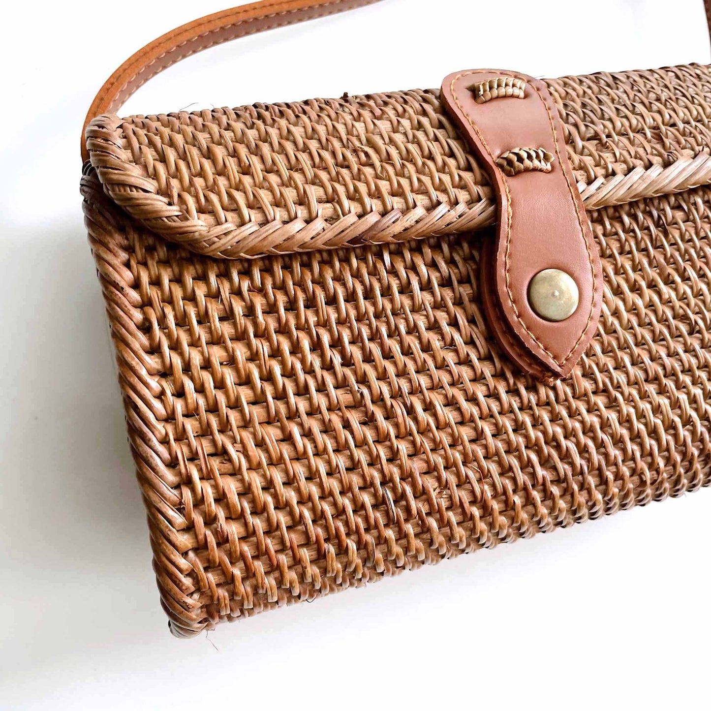 woven boho rattan crossbody with leather strap